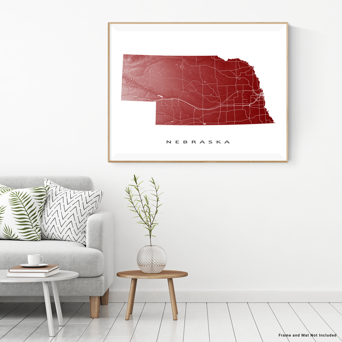 Nebraska state map print with natural landscape and main roads in Merlot designed by Maps As Art.