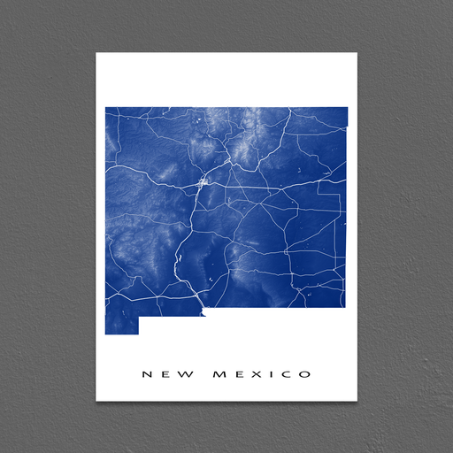 New Mexico state map print with natural landscape and main roads in Navy designed by Maps As Art.