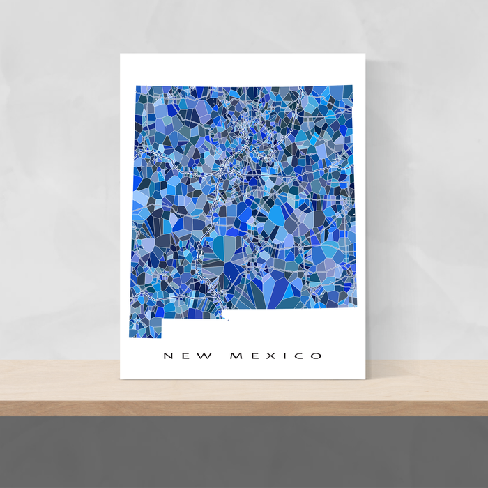 New Mexico state map art print in blue shapes designed by Maps As Art.