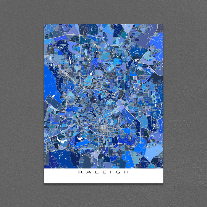 Raleigh, North Carolina map art print in blue shapes designed by Maps As Art.